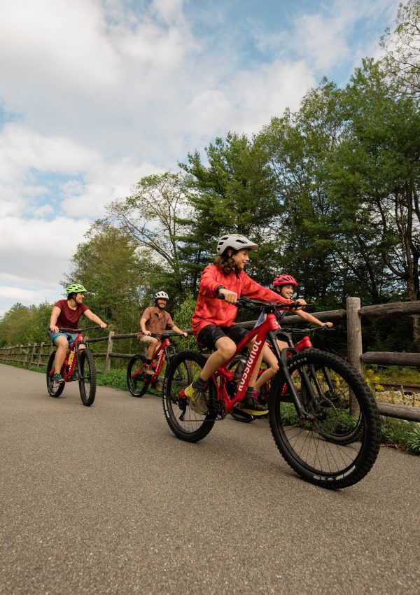 Family riding bike path